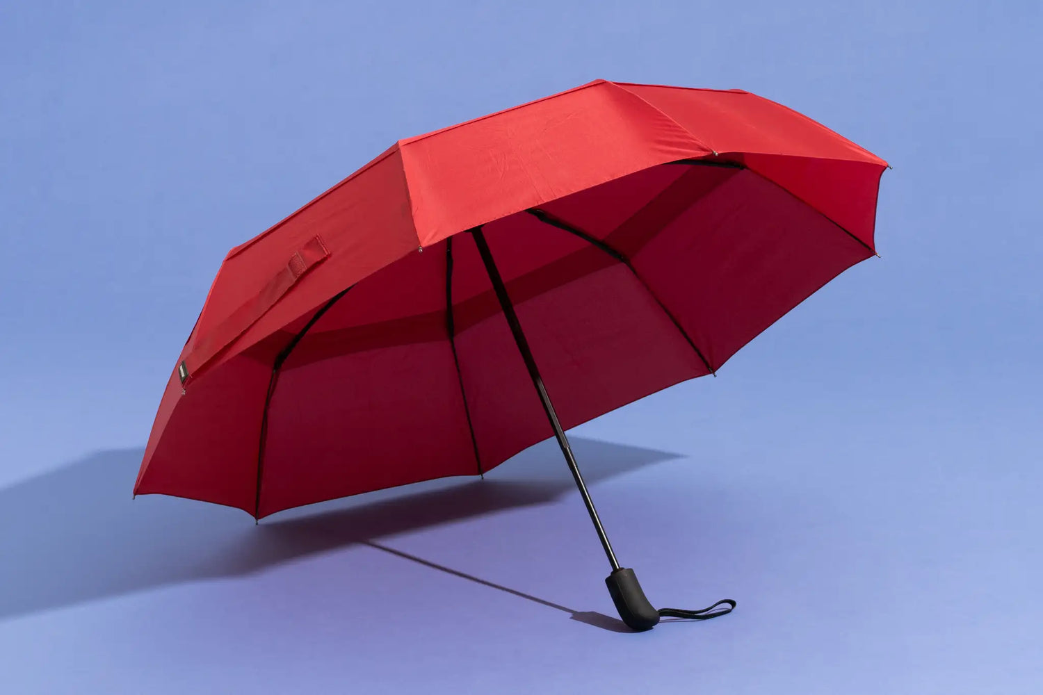 Collection of foldable umbrellas with UV protection for rain and sun