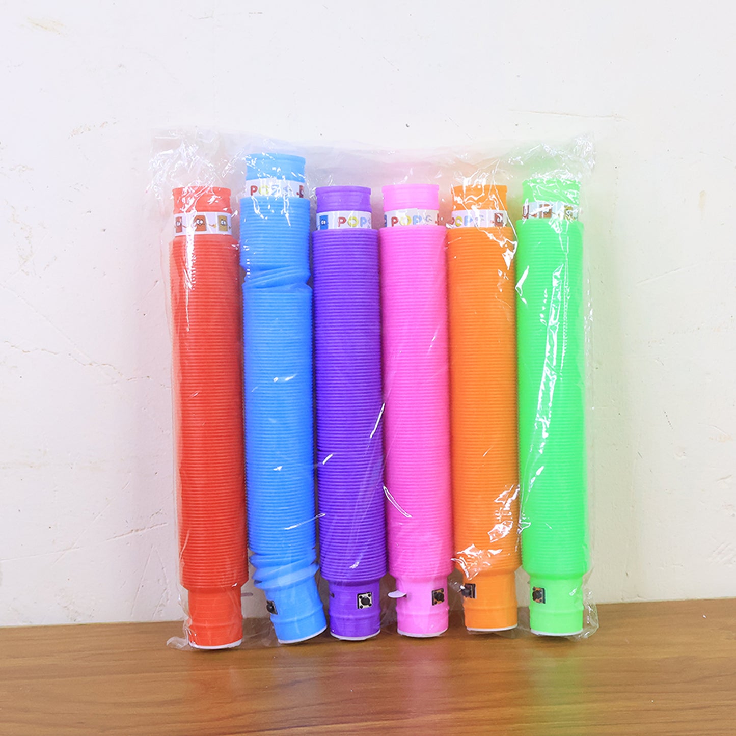 LED Glow Pop Tube Fidget Toy for Kids Stretchable Bendable Light Up Sensory Stress Relief Party Toy Pack of 1 Mixed Color