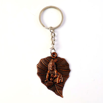 Premium Antique-Finish Metal Keychain with BalKrishna on Peepal Leaf – Elegant Religious Keyring for Car, Bike, Home & Gift (1 Pc)