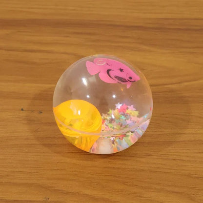 Light-Up Bouncy Fish Ball LED Flashing Sensory Toy with Floating Fish Figurine and Confetti for Kids Party Favors and Stress Relief